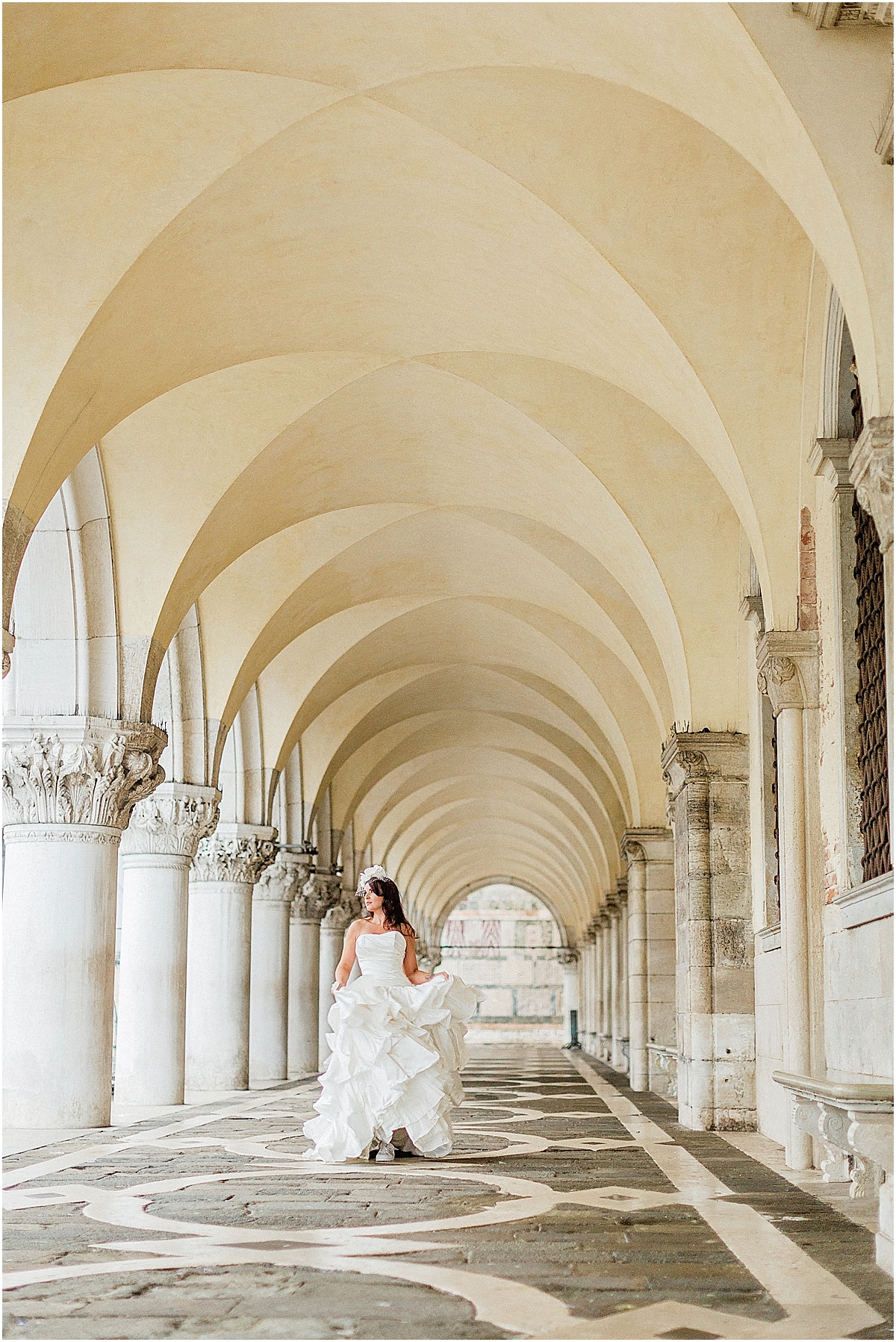 Bride walking down hall at Piazza San Marco Venice Italy Kate Marie Portraiture.jpg